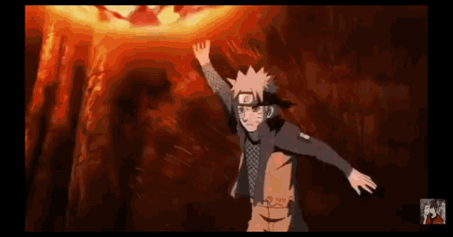 a cartoon character is standing in front of a fireball with his hands in the air .