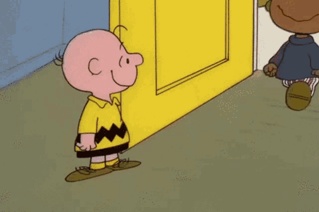 charlie brown and snoopy are shaking hands in a cartoon .
