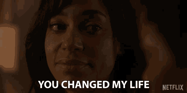 a close up of a woman with the words you changed my life written below her