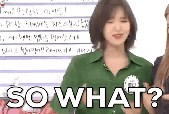 a woman in a green shirt says so what in white letters