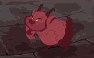 a cartoon character with horns and a big belly is pointing at something
