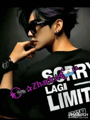 a man wearing sunglasses and a black shirt that says " sorry lagi limit "