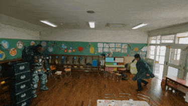 a man in a suit is standing in a classroom with a monster