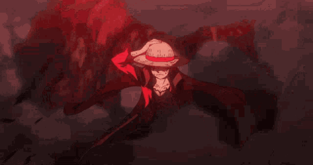 monkey d luffy from one piece is wearing a straw hat and a red jacket .