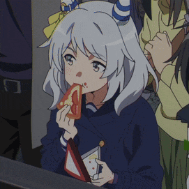 a girl in a blue jacket is eating a sandwich