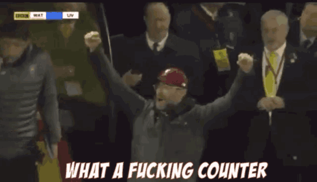 a man in a red hat stands in a crowd with the words " what a fucking counter " below him