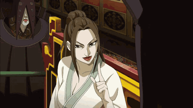 a woman in a kimono is giving a thumbs up sign