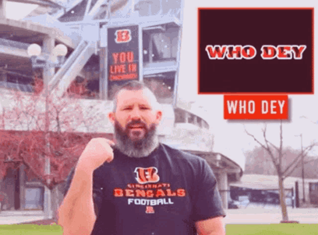 a man wearing a cincinnati bengals football shirt