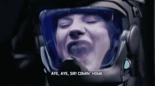 a close up of a person wearing a helmet that says aye aye sir comin home