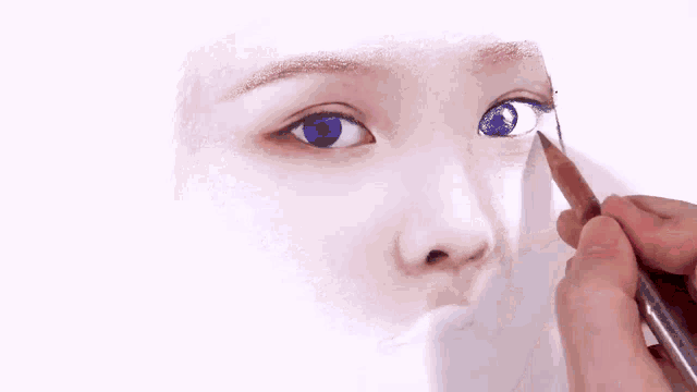 a person is drawing a close up of a woman 's eyes with a blue pencil .