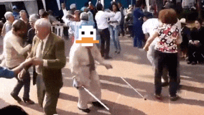 an elderly woman with a cane is dancing in a crowd with a pixelated duck in the background