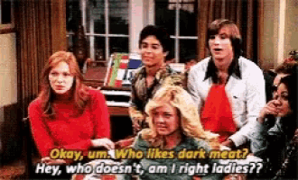 a group of people are sitting around a table and one of them is asking who likes dark meat