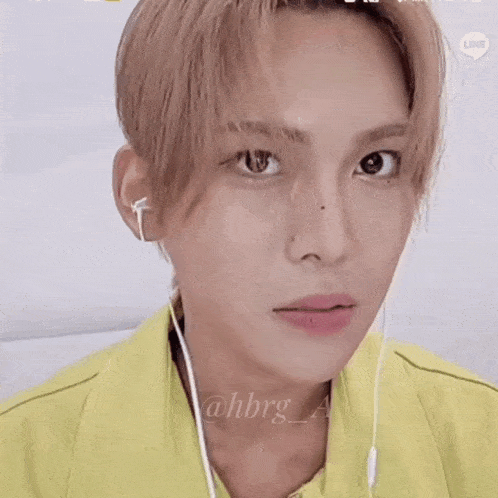 a close up of a person wearing headphones