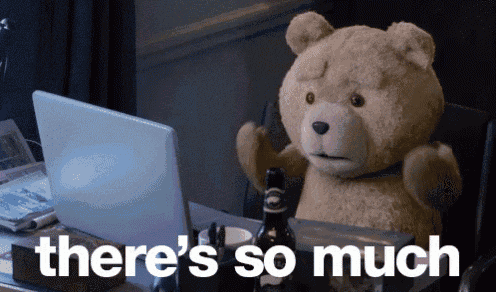 a teddy bear sitting in front of a laptop with the words " there 's so much " written below it