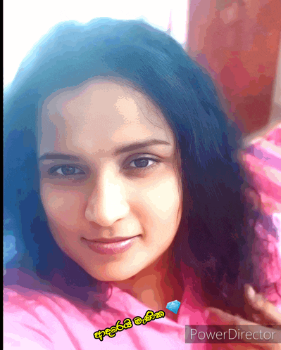 a woman 's face is displayed in a power director app