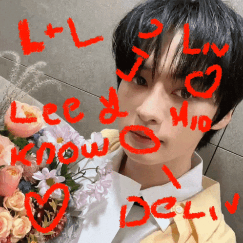 a young man holding a bouquet of flowers with the words lee & mio written in red