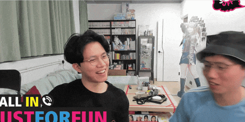 two men are standing in a room with the words all in just for fun