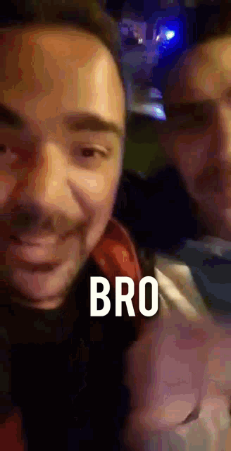 a close up of two men 's faces with the word bro written above them