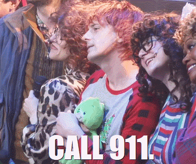 a man holding a teddy bear with the words call 911 on the bottom
