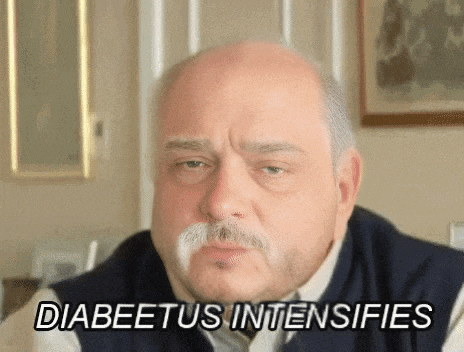 a bald man with a mustache and the words diabetes intensifies written on his face
