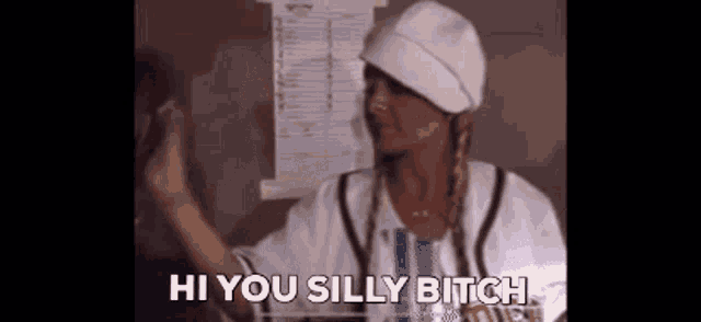 a woman in a baseball uniform is saying hi you silly bitch