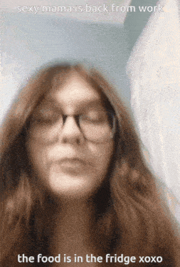 a woman wearing glasses and a caption that says sexy mama is back from work the food is in the fridge xoxo