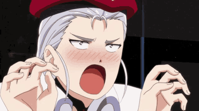 a woman with white hair and a red hat is making a face