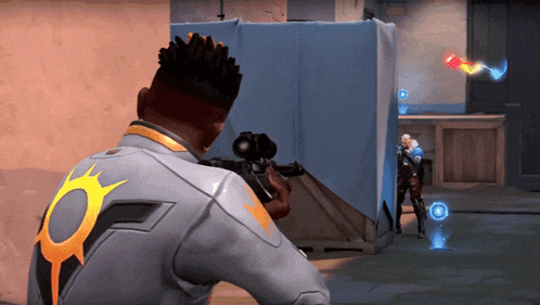 a man holding a sniper rifle in a video game with a circle on his back