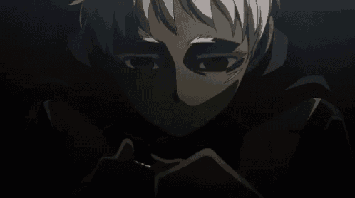 a close up of a person 's face with a black background