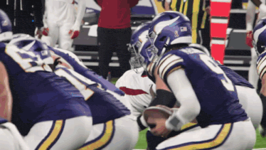 a football player wearing a helmet that says nfl on it