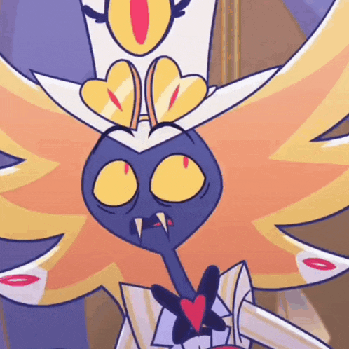a close up of a cartoon character with wings and a crown on his head .