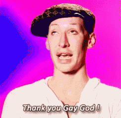 a man wearing a hat and a white shirt says thank you gay god
