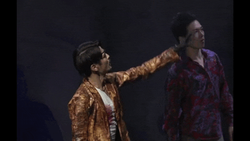 two men are standing next to each other and one of them says " bye "