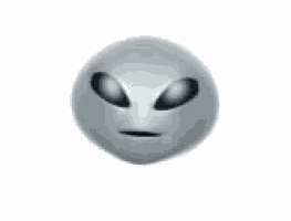 a close up of a silver alien mask with glowing eyes and a black mouth on a white background .