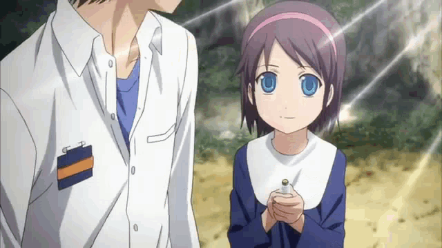a boy and a girl are standing next to each other and the girl has a name tag that says g.i.