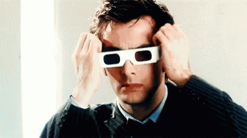 a man is wearing a pair of 3d glasses .