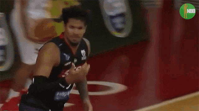 a basketball player wearing a jersey that says nba on it