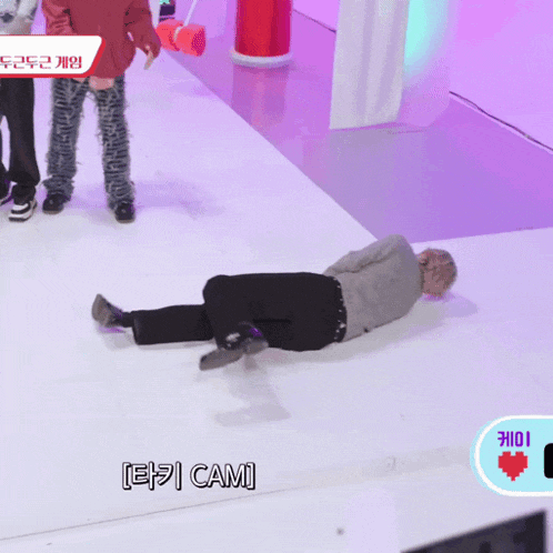 a person laying on their back with the word cam written on the bottom
