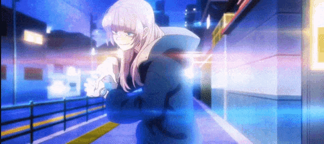 a girl with long blonde hair is walking down a sidewalk in a city .