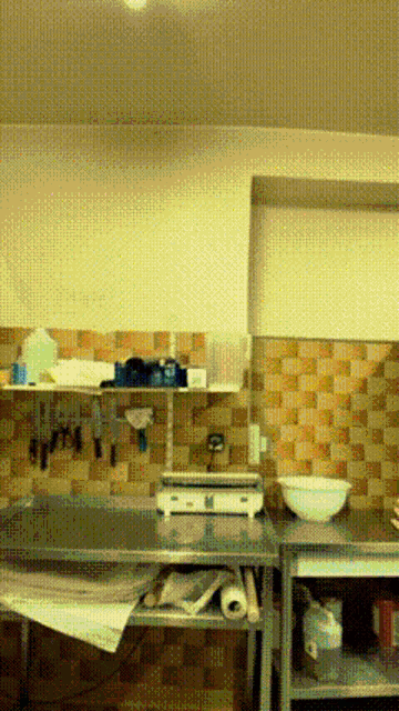 a kitchen with a stove and a bowl on the counter