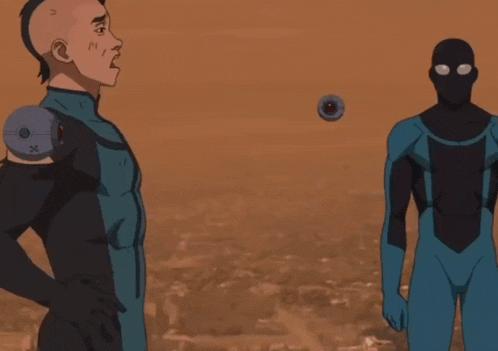a man with a mohawk stands next to another man in a superhero costume