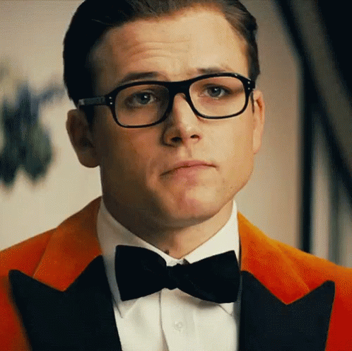 Wink The Golden Circle GIF - Wink The Golden Circle Kingsman GIFs
