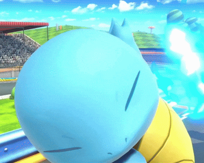 a blue and yellow cartoon character is laying down on a track