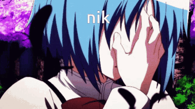 a girl with blue hair is covering her face with her hand and the word nik is on the bottom