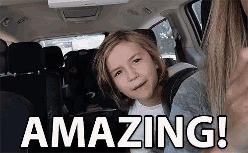 a little girl sitting in the back seat of a car with the words amazing written on the bottom
