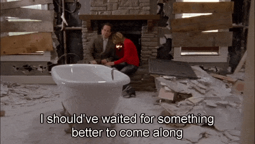 a man and woman sit in front of a bathtub with the words " i should 've waited for something better to come along "