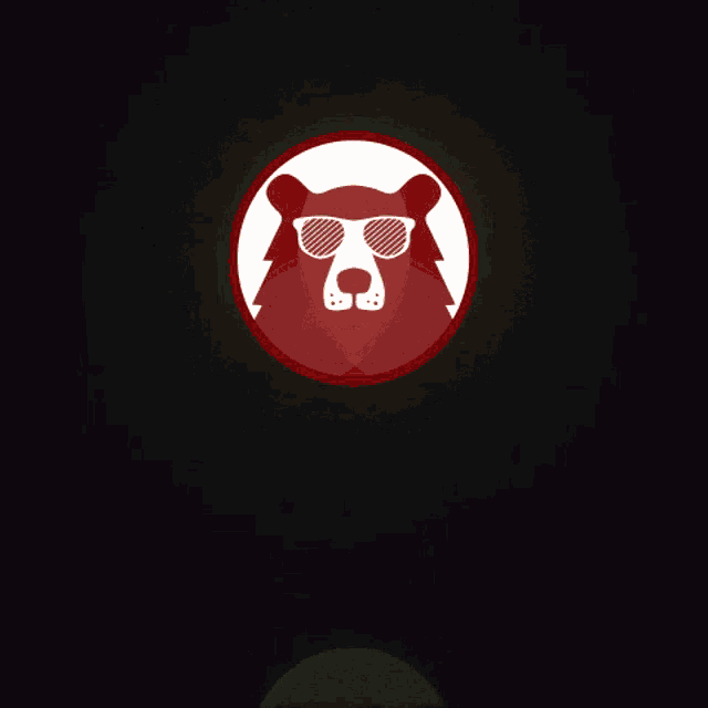 a red circle with a bear wearing sunglasses