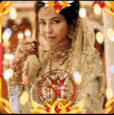 a blurry picture of a woman in a wedding dress with a star on her chest
