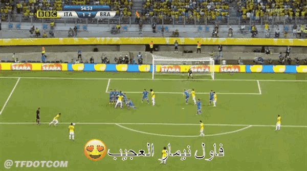 a soccer game is being played in a stadium with bbc advertising on the sidelines