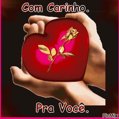 a person is holding a heart with two roses on it and the words com carinho pra voce